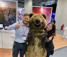 Our employees with bear-shaped growth doll.